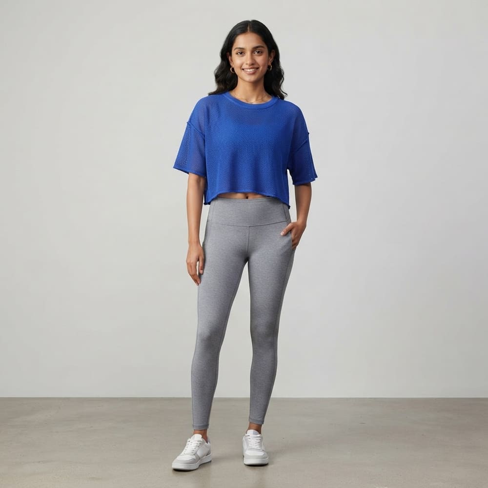 Indian woman wearing META NEST ACTIVEWEAR AirQueen Crop Tee in Cobalt Blue