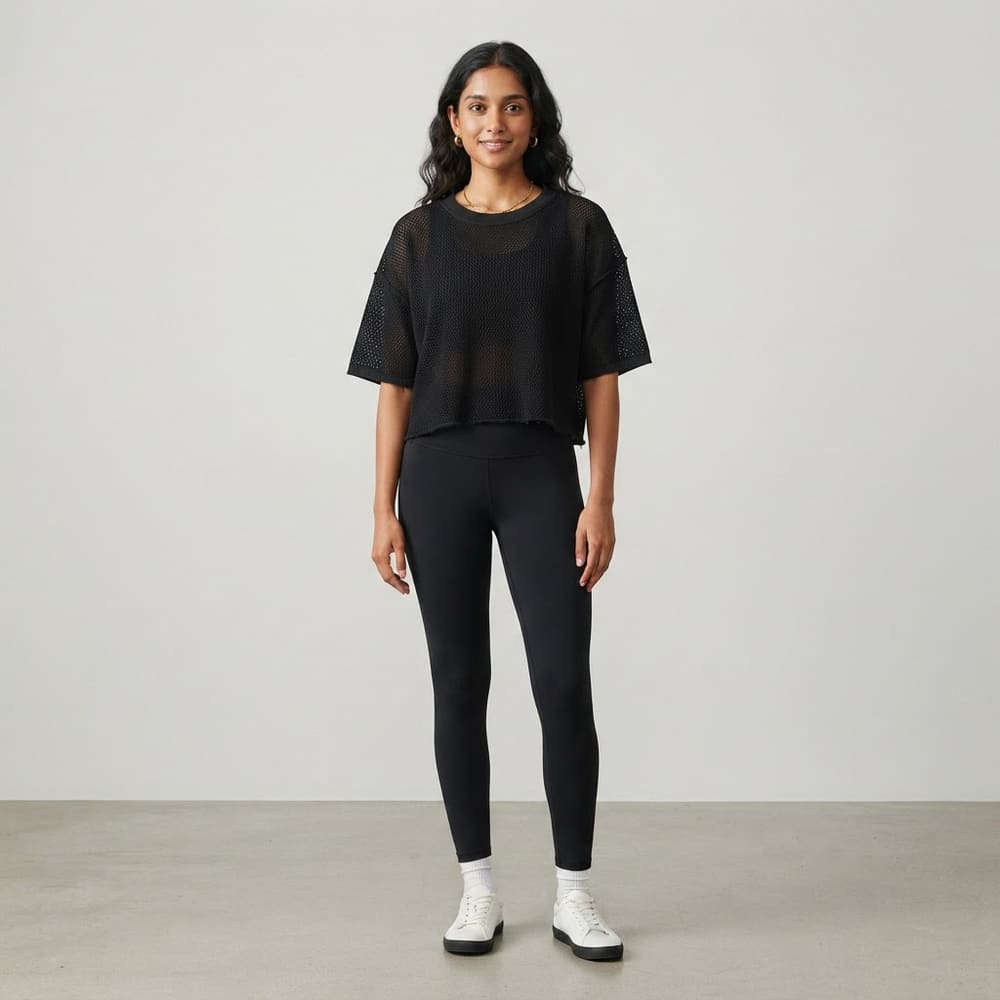 Indian woman wearing META NEST ACTIVEWEAR AirQueen Crop Tee in Noir Black