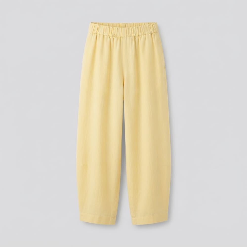 Indian woman wearing META NEST ACTIVEWEAR Butter Wide-Leg Ankle Pants in Butter Yellow