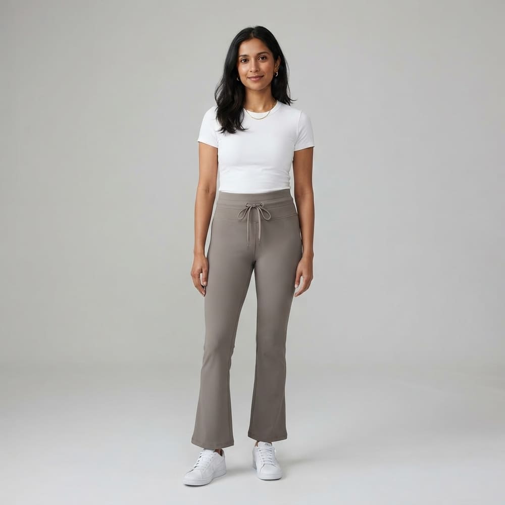 Indian woman wearing META NEST ACTIVEWEAR Cloudsoft Tummy-Control Flare Pants in Taupe Grey