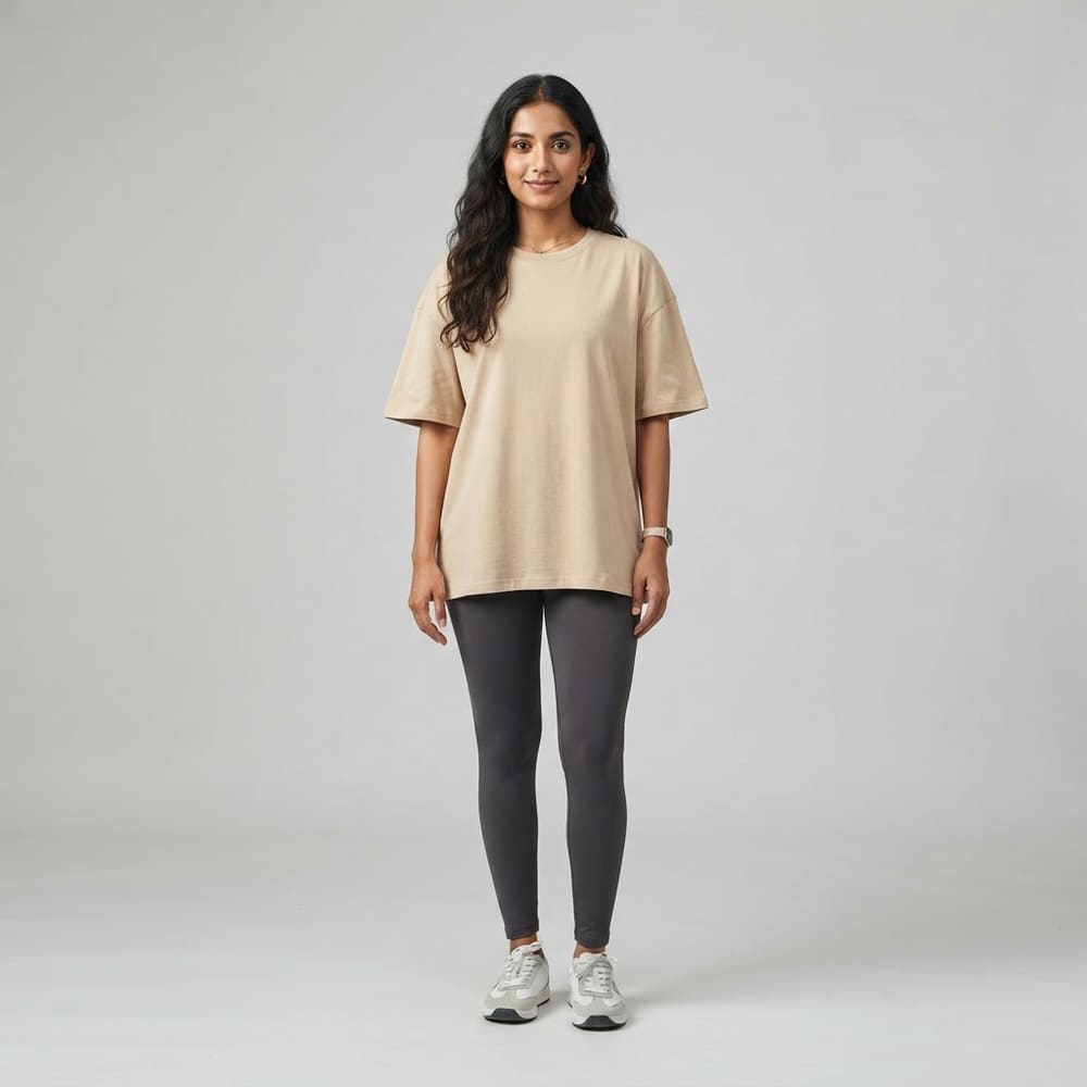 Indian woman wearing META NEST ACTIVEWEAR Cotton-Pro Classic Crew Tee in Desert Sand
