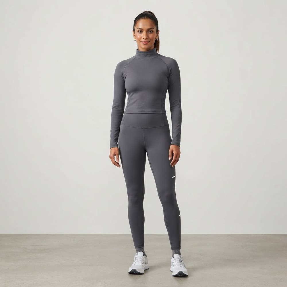 Indian woman wearing META NEST ACTIVEWEAR High-Neck Training Top in Graphite Grey
