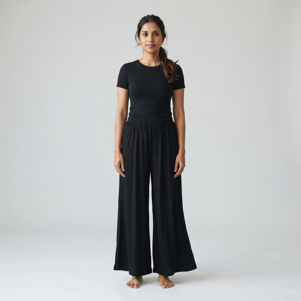 Indian woman wearing META NEST ACTIVEWEAR Palazzo Flow Pants in Noir Black