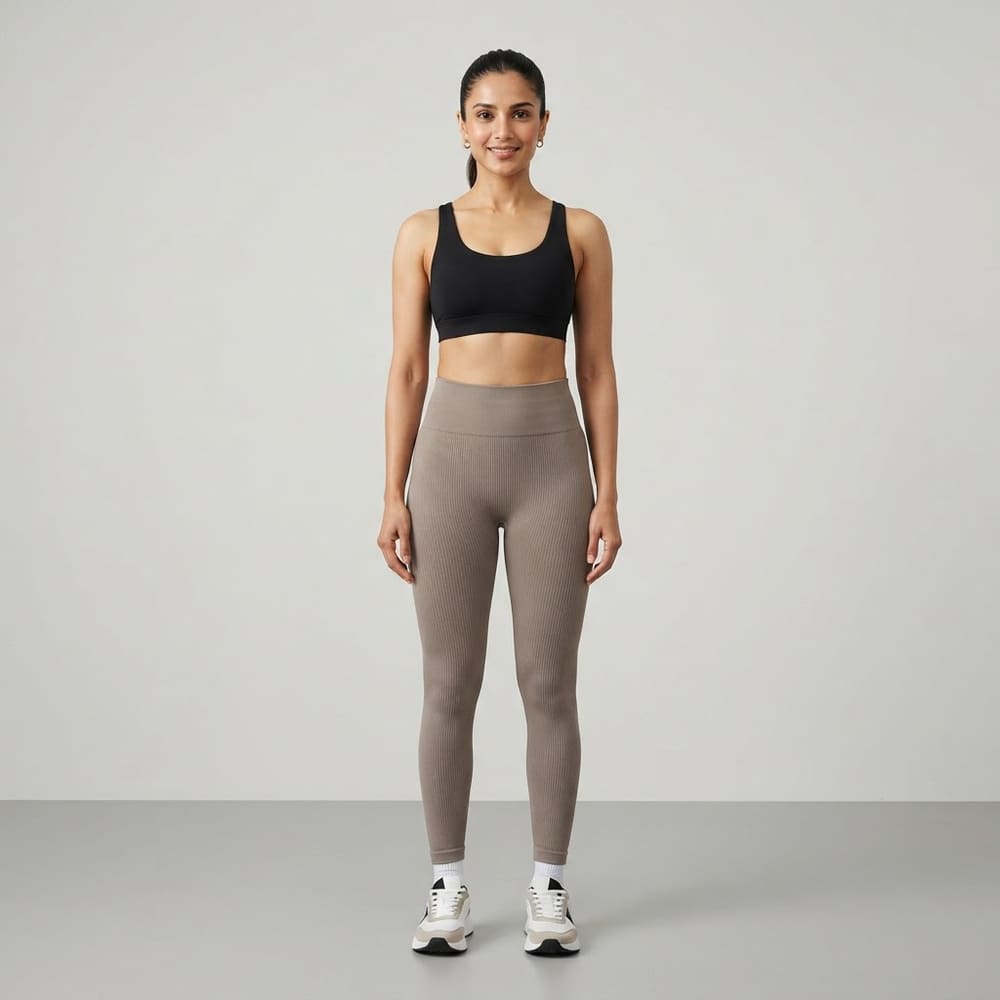Indian woman wearing META NEST ACTIVEWEAR Ribbed Seamless Leggings in Ribbed Seamless Taupe