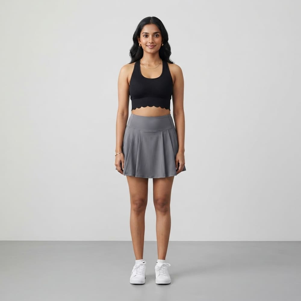 Indian woman wearing META NEST ACTIVEWEAR Scallop-Hem Racerback Bra Top in Noir Black
