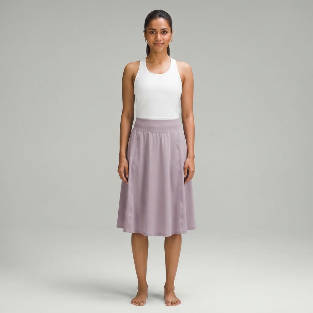 Indian woman wearing META NEST ACTIVEWEAR Side-Slit A-Line Tennis Skort in Dusty Lilac