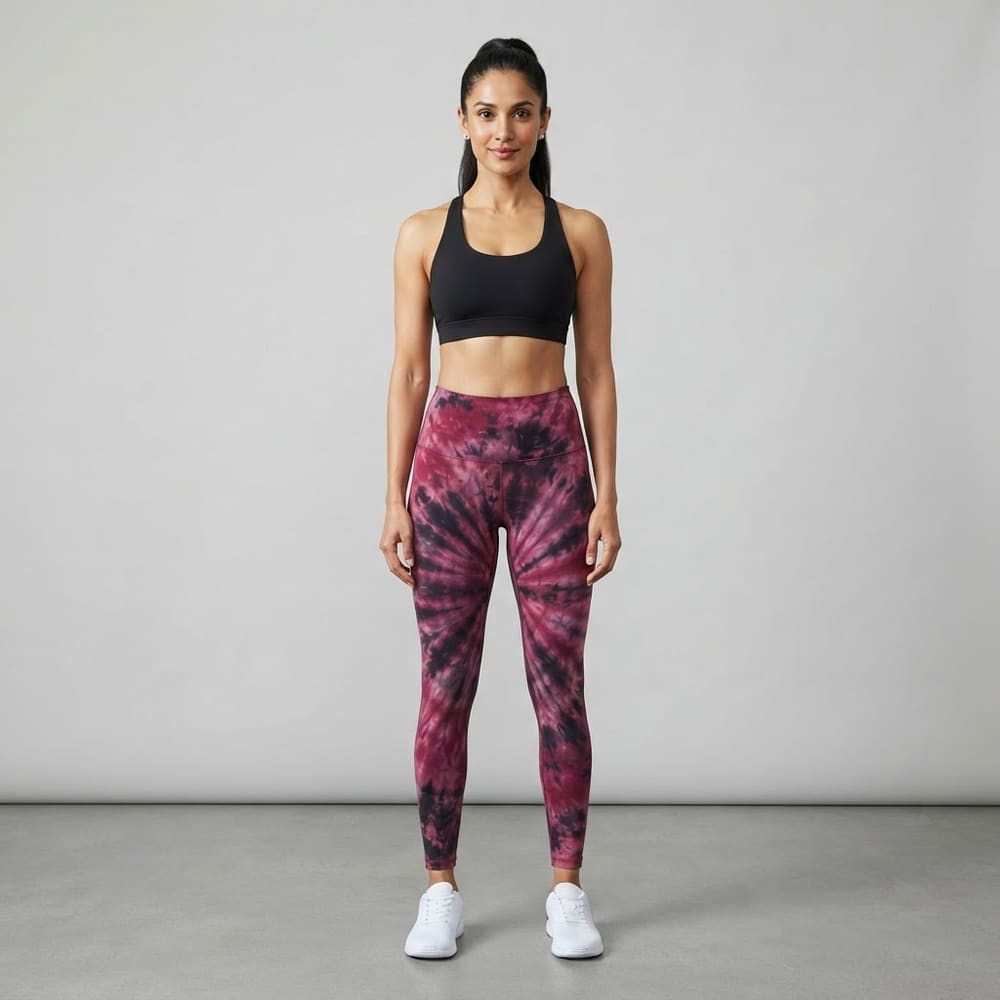 Indian woman wearing META NEST ACTIVEWEAR Tie-Dye Swirl Leggings in Tie-Dye Berry